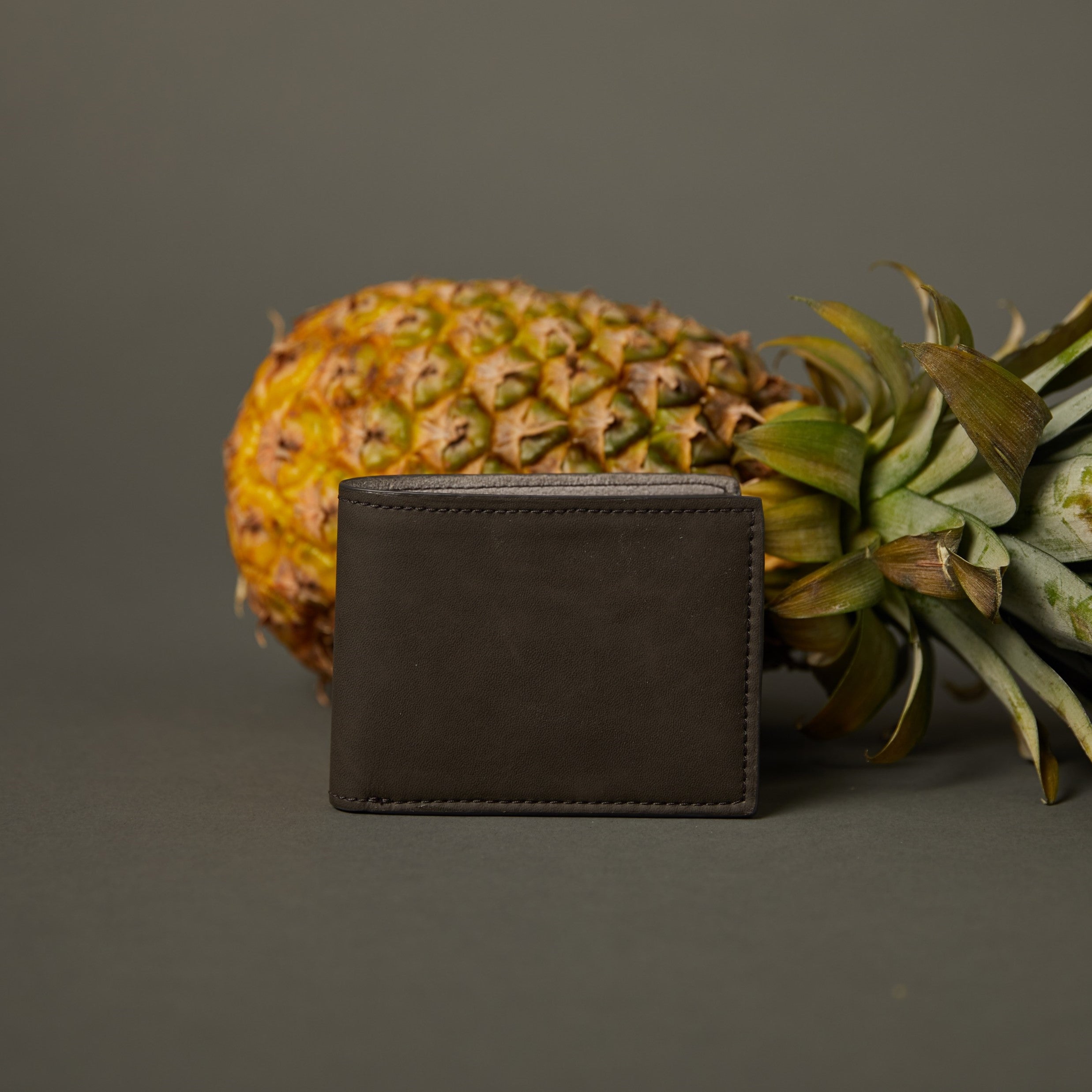 dark grey wallets made from pineapple leaves