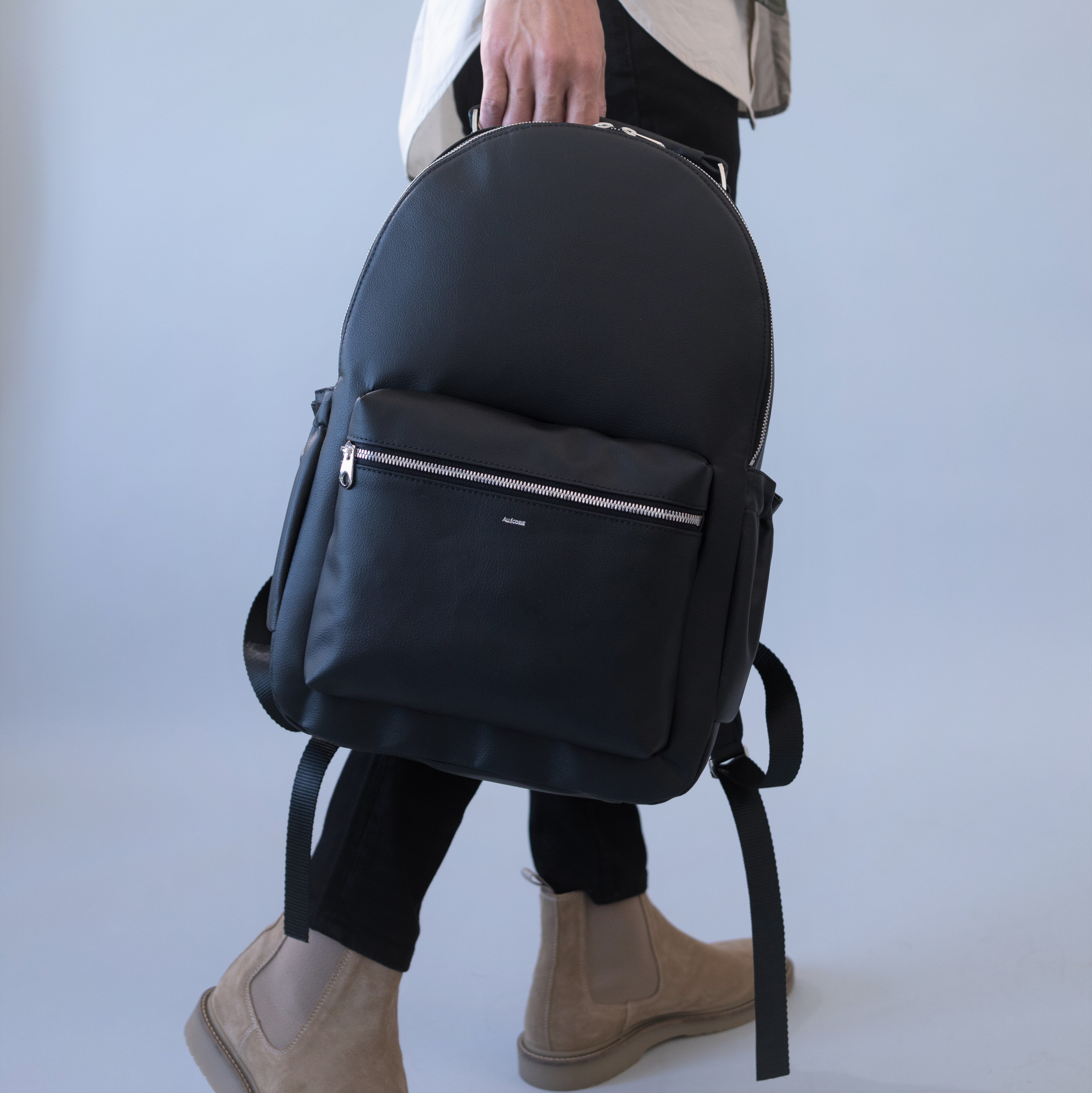 sustainable black backpack made from apples