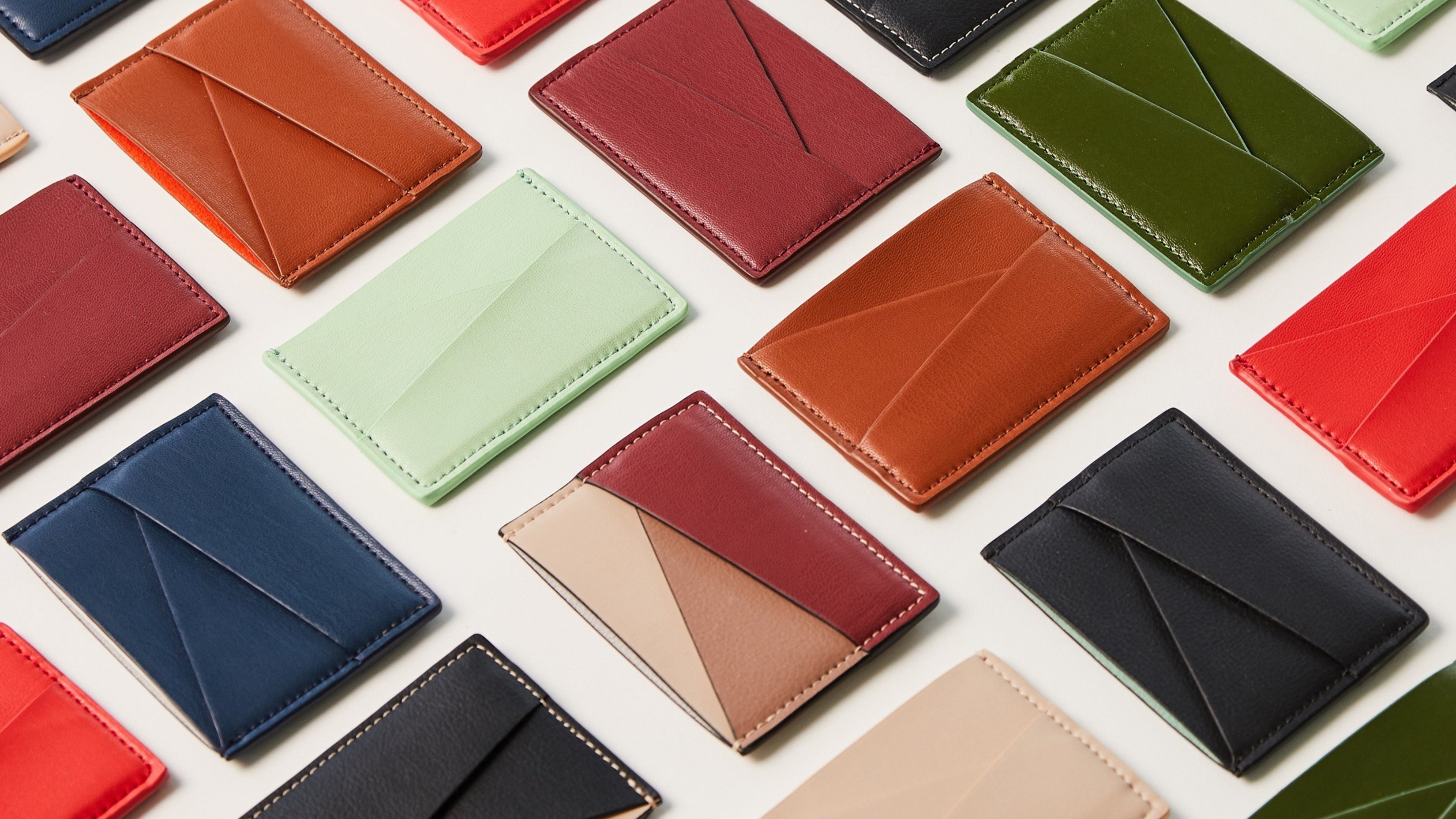 wallets and cardholders made from apples cactus and pineapples