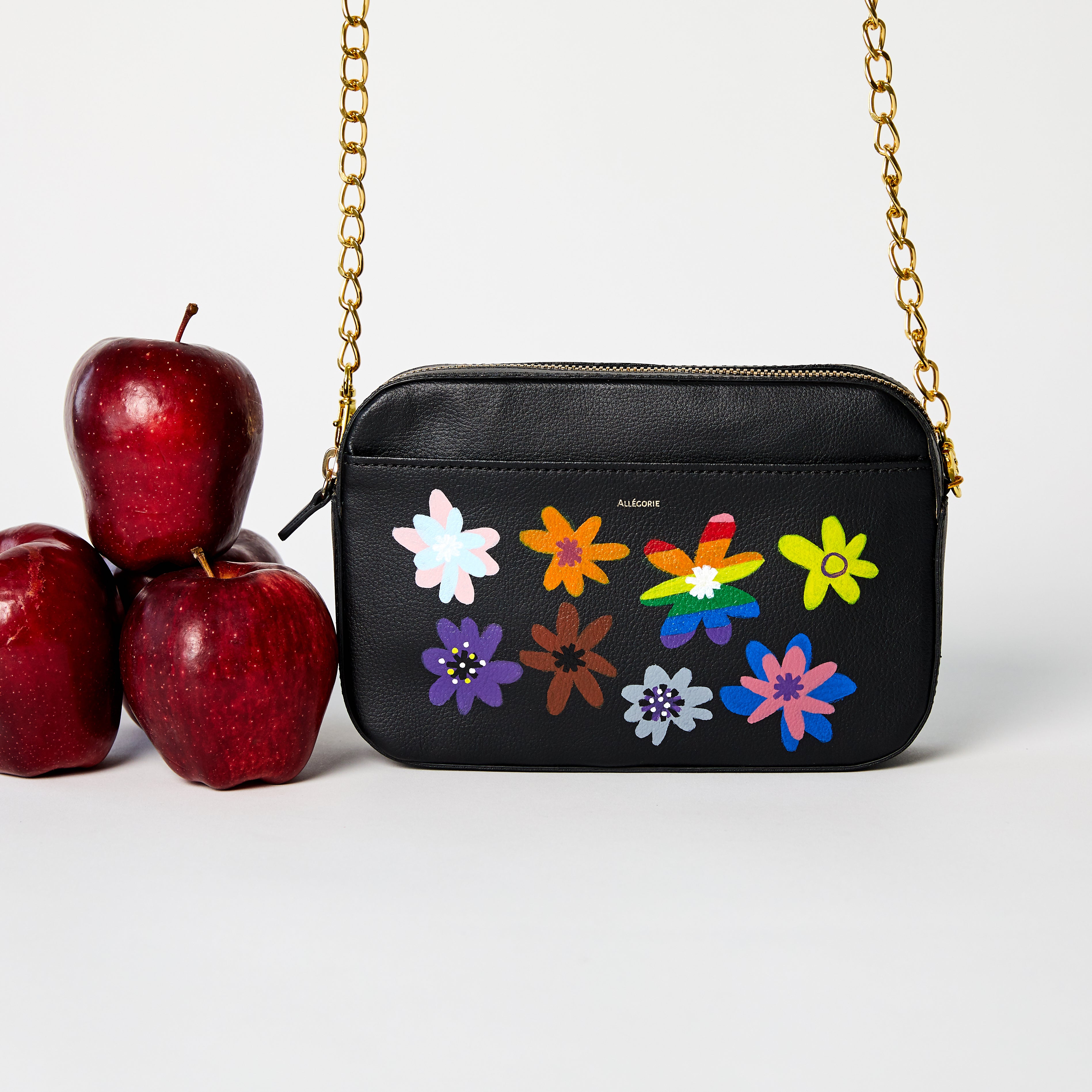 pride flowers hand painted by LGBTQA artist on black vegan sustainable crossbody bag