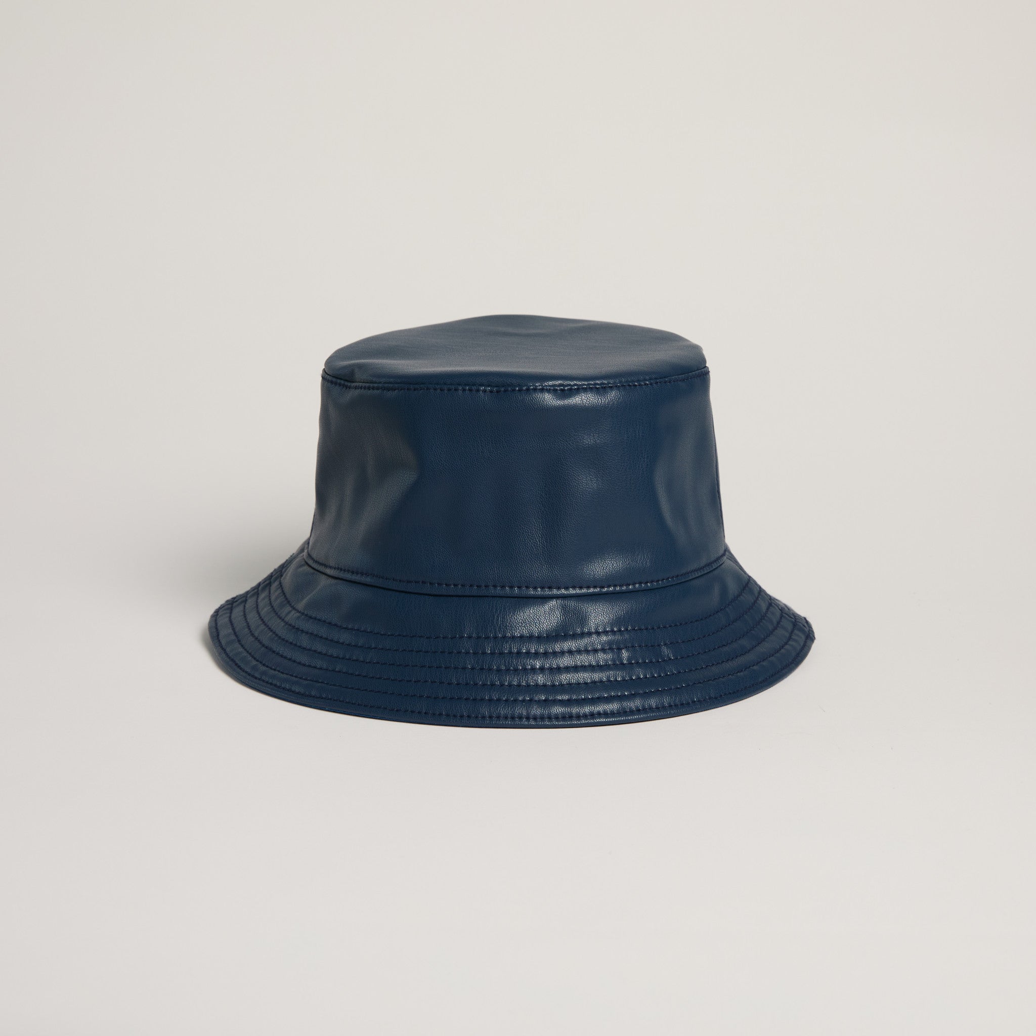 Apple leather navy bucket hat