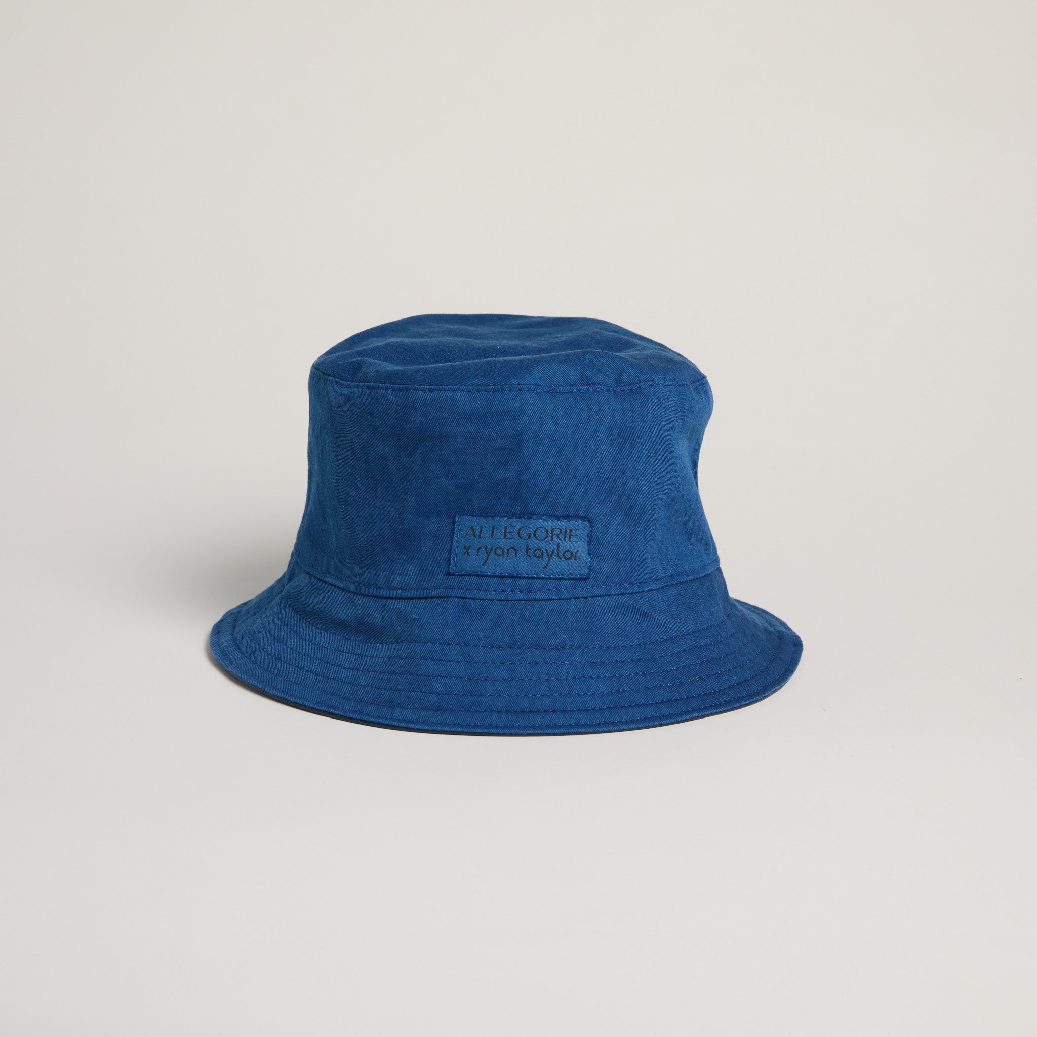 Apple leather navy bucket hat indigo inside