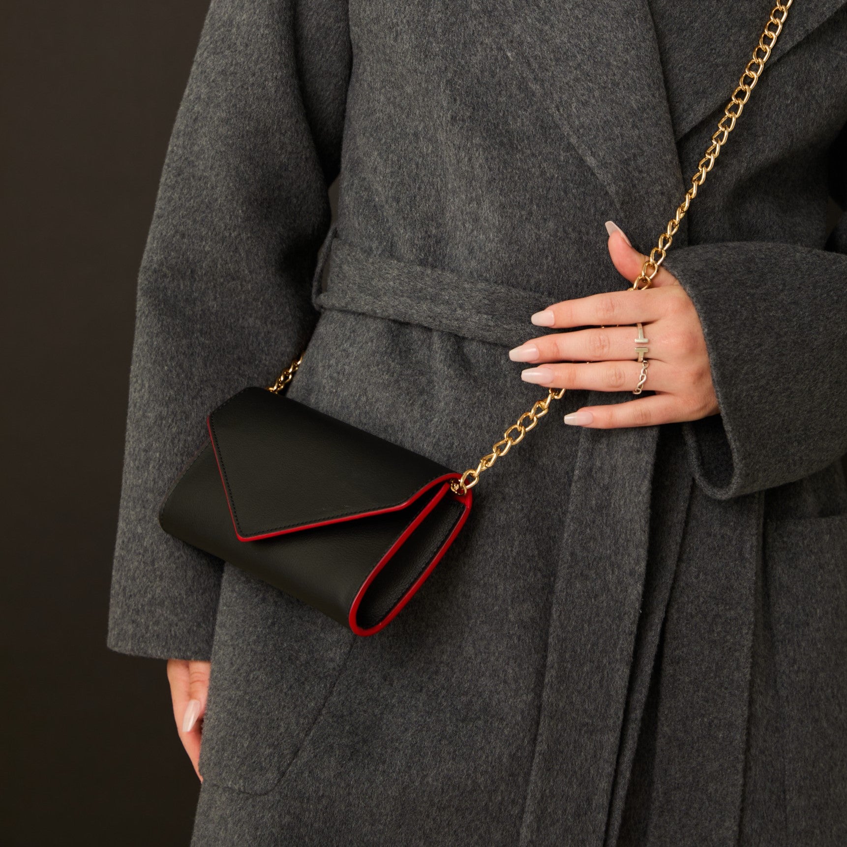 vegan clutch with chain in black and red apple leather